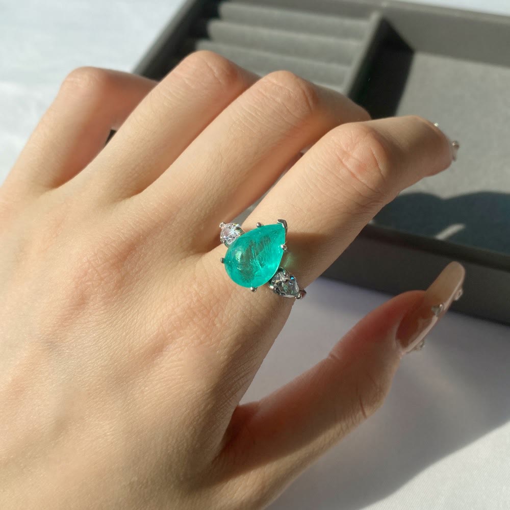Bague exquise en zircon blanc et tourmaline Paraiba Olivenorma
