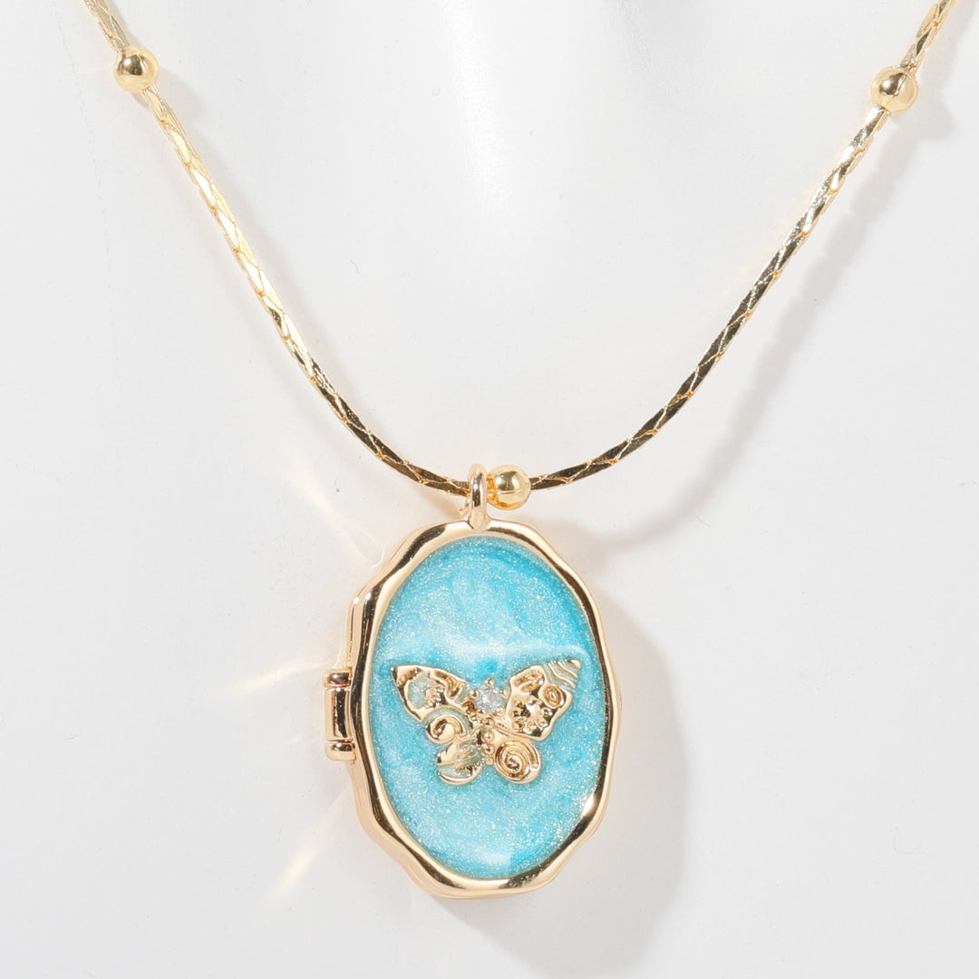 Collier pendentif papillon en nacre Olivenorma en cuivre plaqué or 14 carats 