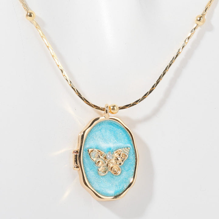 Collier pendentif papillon en nacre Olivenorma en cuivre plaqué or 14 carats 