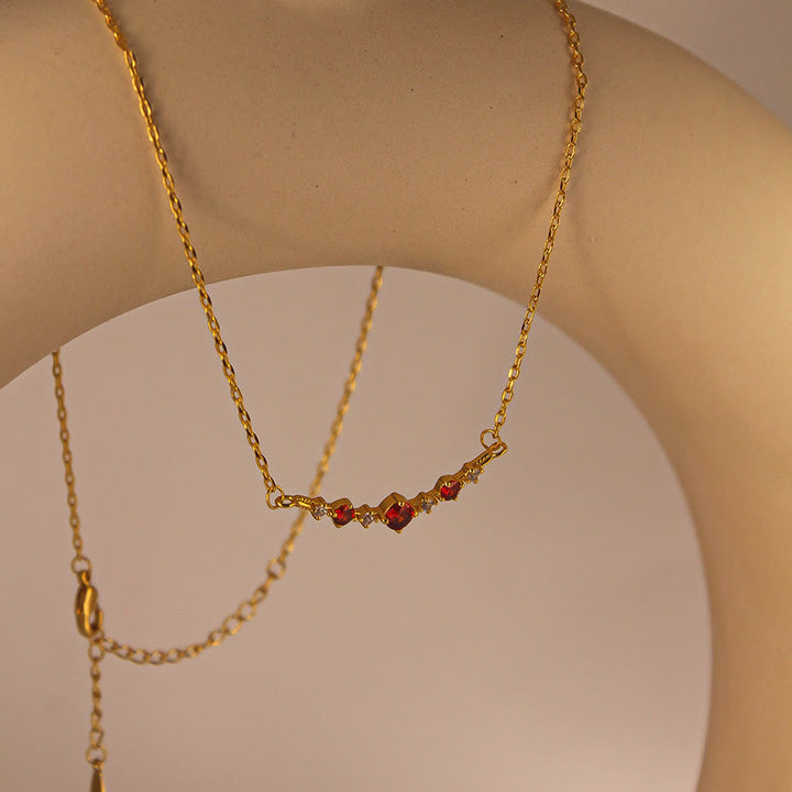 Collier Olivenorma « Symbole d'indépendance » avec diamants et grenats