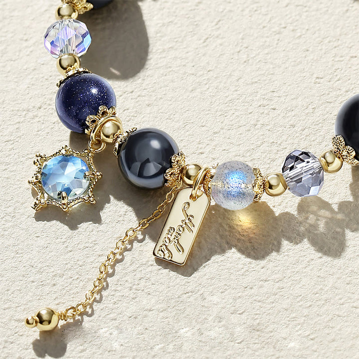 Bracelet de perles en obsidienne et pierre de lune en grès bleu Olivenorma 