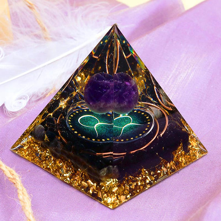 Sphère d'améthyste Olivenorma avec pyramide d'orgone du zodiaque Taureau en obsidienne