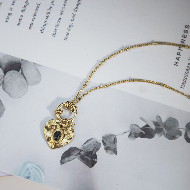 Collier pendentif coeur turquoise noir en acier titane Olivenorma 