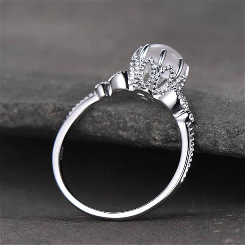 Olivenorma ronde en pierre de lune et opale blanche avec zircon