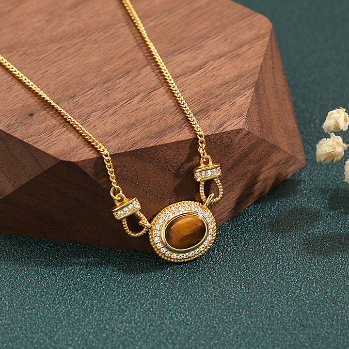 Collier rétro en pierre œil de tigre Olivenorma « Le livre de la galaxie »