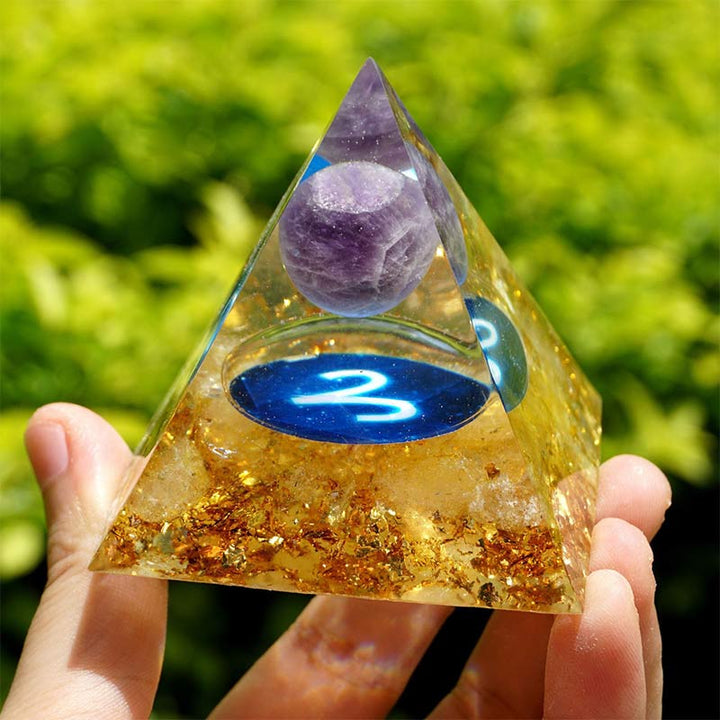 Pyramide d'orgone du zodiaque Bélier en améthyste Olivenorma avec rutile doré