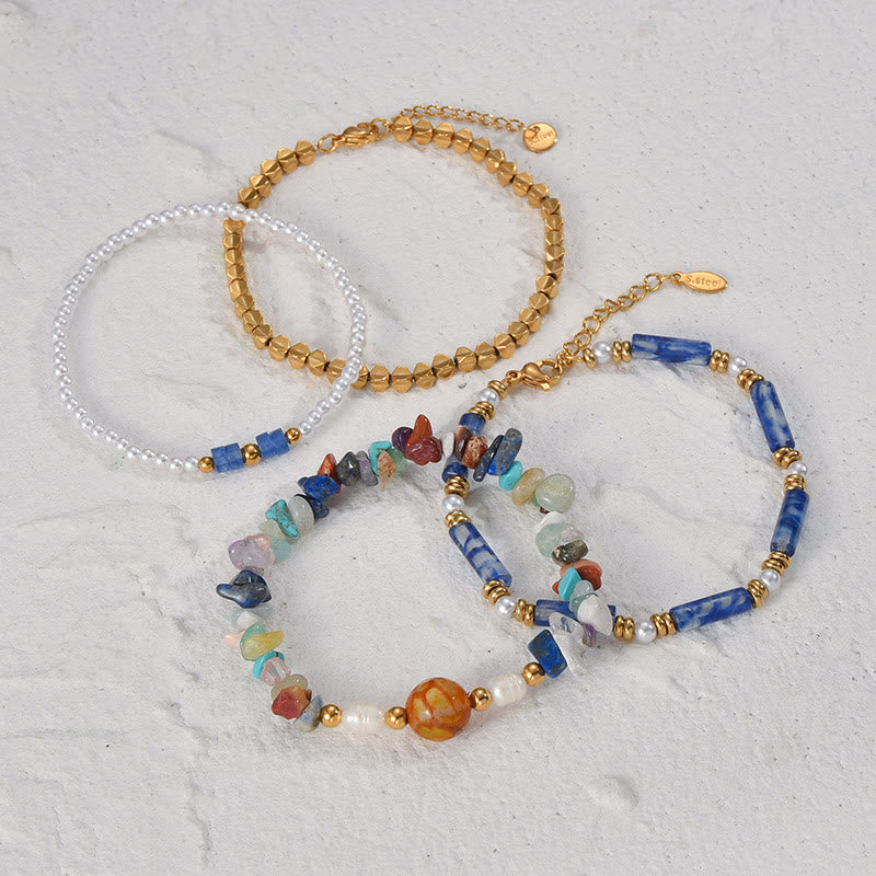 Ensemble de quatre bracelets en perles de cristal naturel Olivenorma