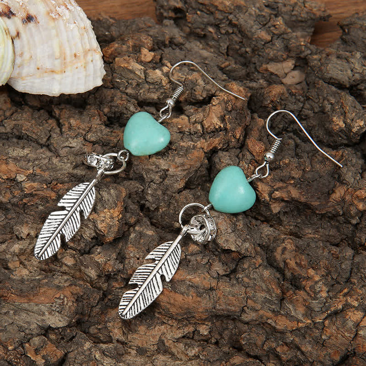 Boucles d'oreilles vintage en forme de cœur et de plumes turquoise
