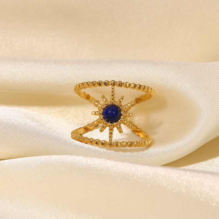 Bague Olivenorma en forme d'étoile à huit branches et à double rangée de tournesols 