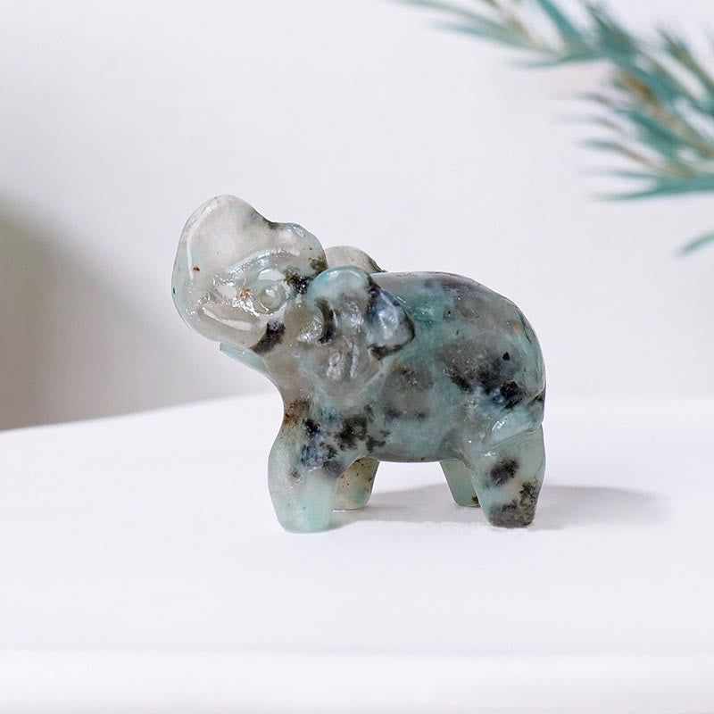 Ornement en pierre précieuse sculptée en cristal naturel Olivenorma