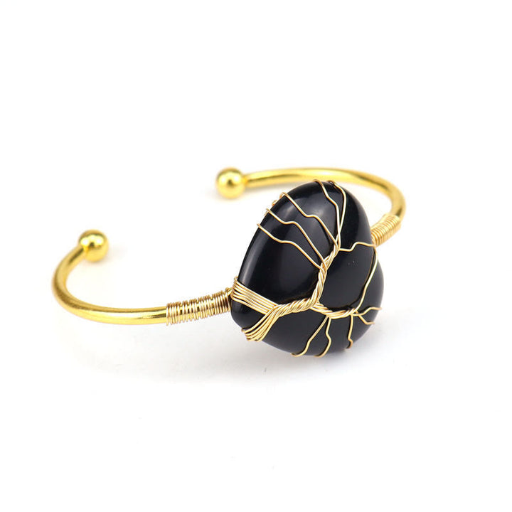 Bracelet en cristal naturel en forme de cœur enveloppé de fil de cuivre doré Olivenorma 