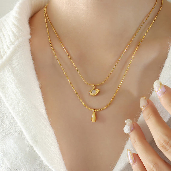 Collier double couche avec pendentif en opalite contre le mauvais œilnorma Olivenorma 