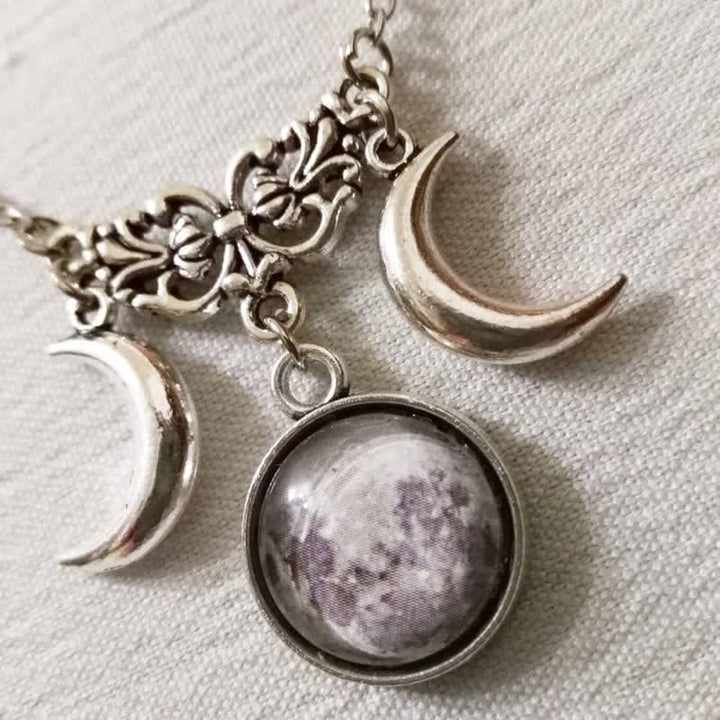 Collier en verre à double croissant de lune vintage Olivenorma