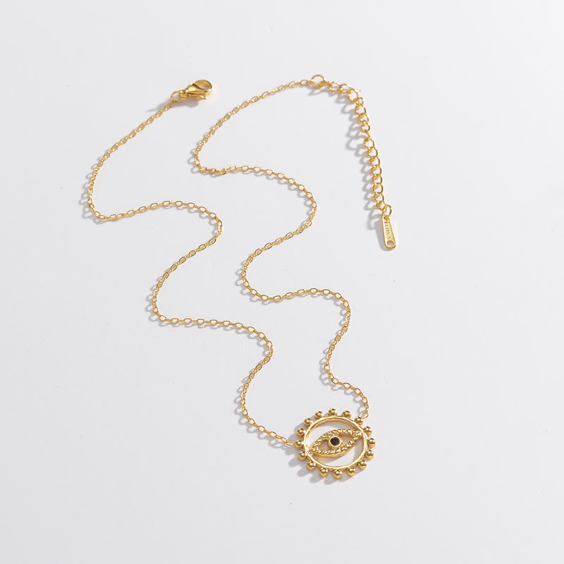 Collier rond creux en acier inoxydable plaqué or 18 carats avec mauvais œil Olivenorma
