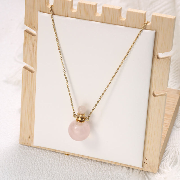 Collier pendentif bouteille de parfum en pierre ronde Olivenorma