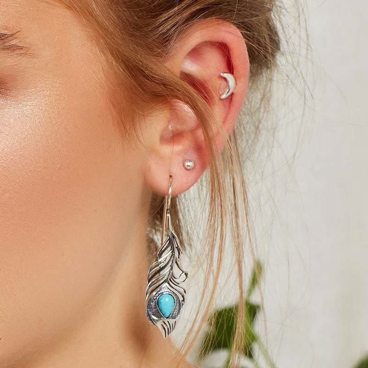 Boucles d'oreilles bohèmes découpées en plumes de paon turquoise vintage Olivenorma