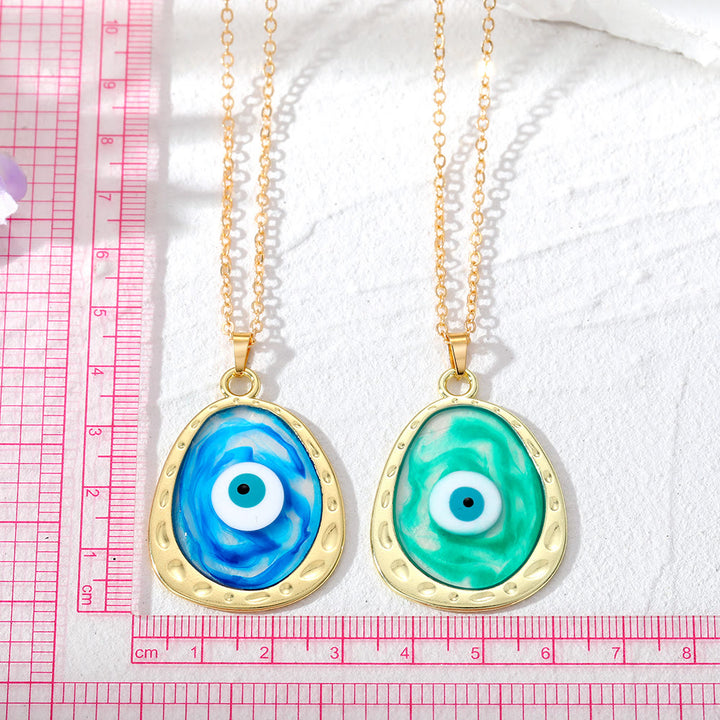 Collier en époxy multicolore contre le mauvais œil Olivenorma 
