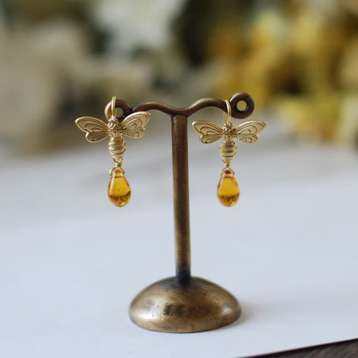 Boucles d'oreilles et collier en ambre avec pendentif en forme de goutte d'eau et de miel Olivenorma Bee Topaz