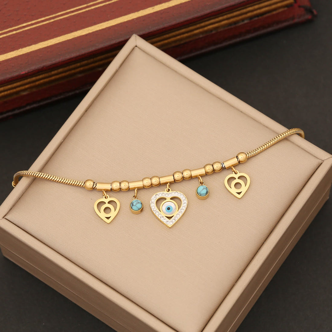 Collier et boucles d'oreilles Olivenorma en zircone turquoise avec mauvais œil 