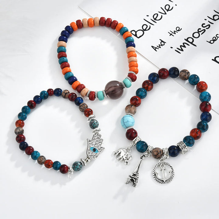 Ensemble de bracelets Hamsa contre le mauvais œil avec la tour de l'éléphant Olivenorma