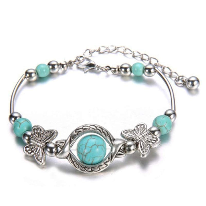 Bracelet papillon en sphère turquoise Olivenorma