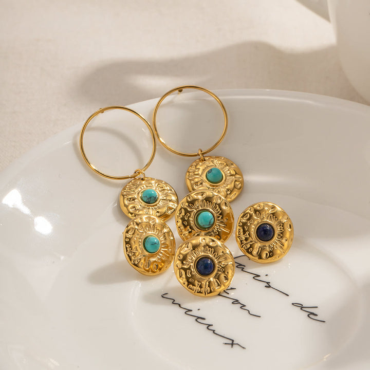 Boucles d'oreilles Olivenorma en acier titane doré et sodalite turquoise