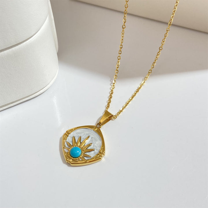 Collier avec pendentif soleil turquoise Olivenorma plaqué or 18 carats