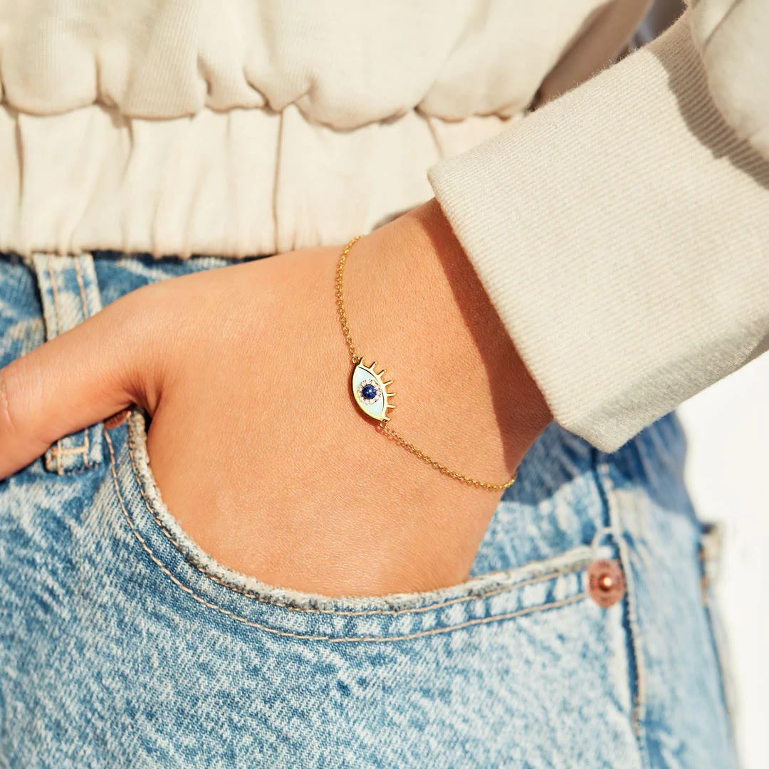 Bracelet fin en or et zircone contre le mauvais œil Olivenorma « SAFE &amp; PROTECTED »