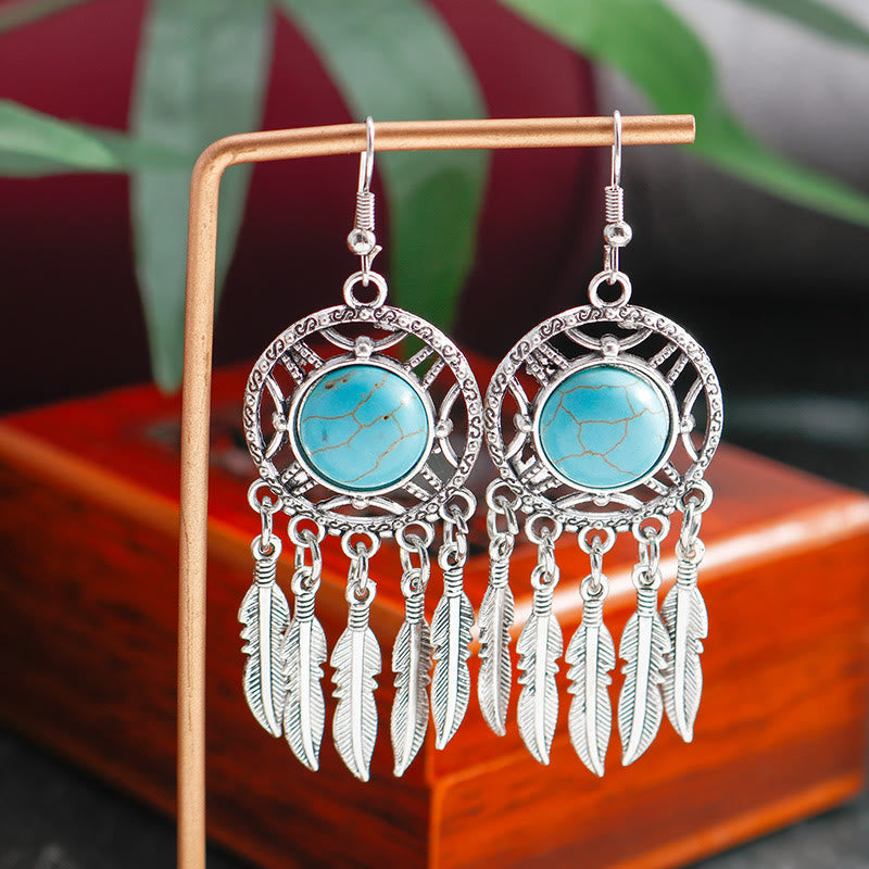 Boucles d'oreilles à pompons en plumes turquoise style bohème Olivenorma - image 1