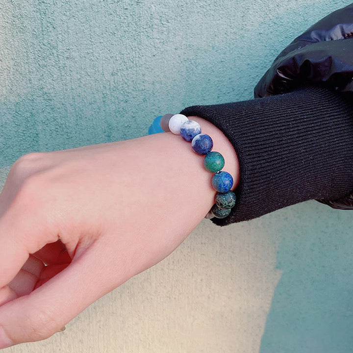 Bracelet planète en perles naturelles givrées de 10 mm Olivenorma 