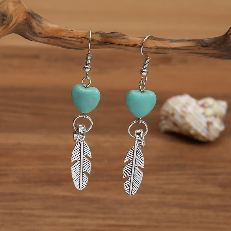 Boucles d'oreilles vintage en forme de cœur et de plumes turquoise