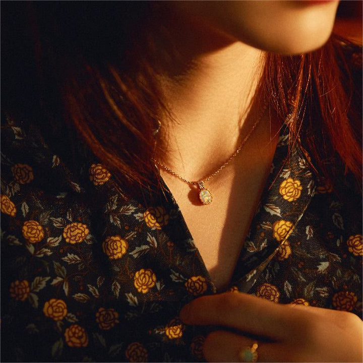 Collier avec anneau en or jaune opale Olivenorma 