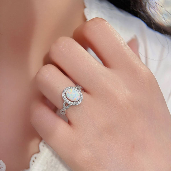 Bague tressée en zircon blanc et opale ovale Olivenorma