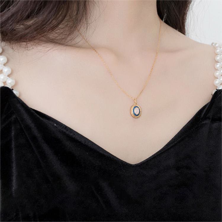 Collier avec pendentif incrusté d'opale naturelle Olivenorma