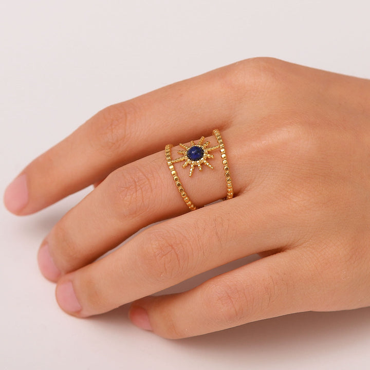 Bague Olivenorma en forme d'étoile à huit branches et à double rangée de tournesols 