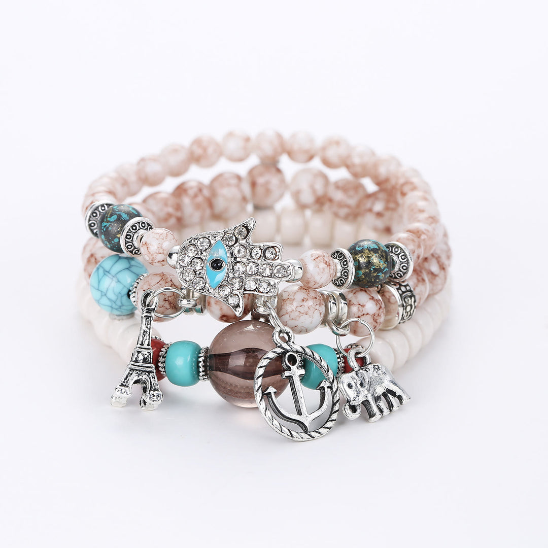 Ensemble de bracelets Hamsa contre le mauvais œil avec la tour de l'éléphant Olivenorma