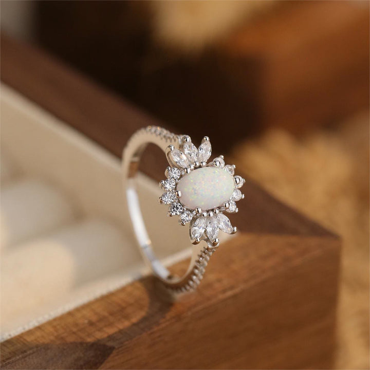 Bague en argent 925 avec motif tournesol et opale blanche et bleue Olivenorma 