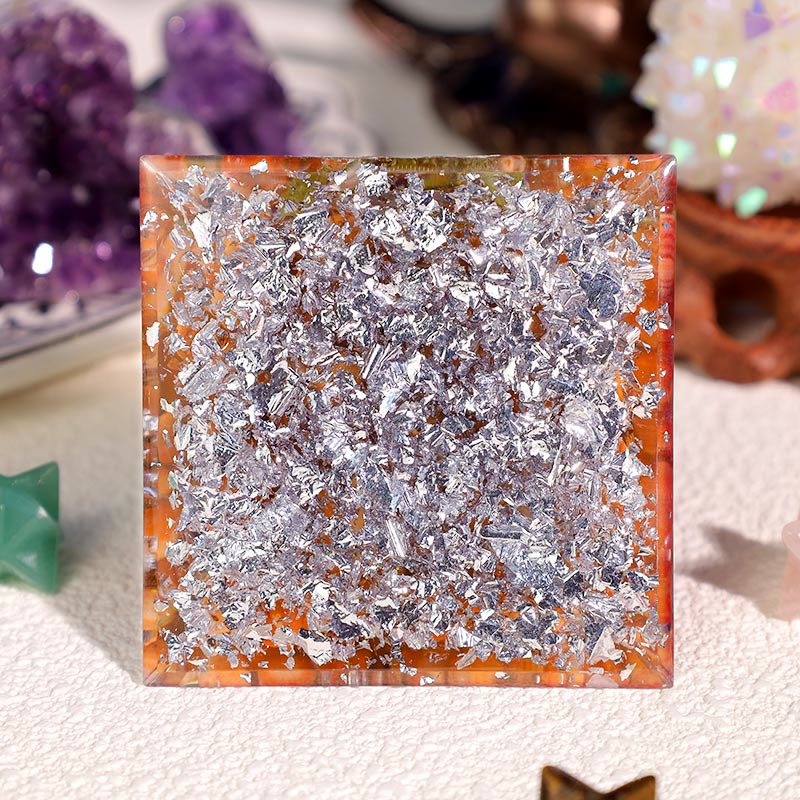 Pyramide d'orgone en corail rouge amazonite Olivenorma œil d'Horus