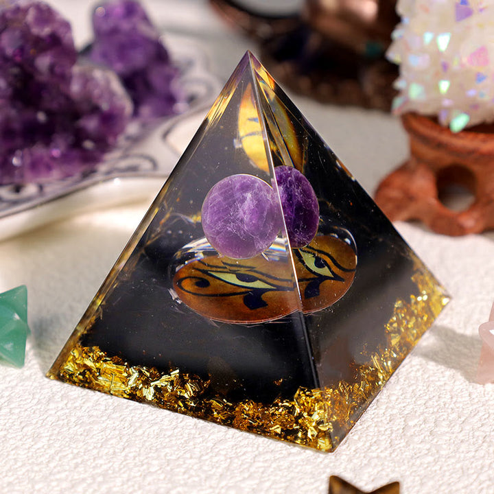 Pyramide d'orgone Oeil d'Horus en obsidienne améthyste Olivenorma