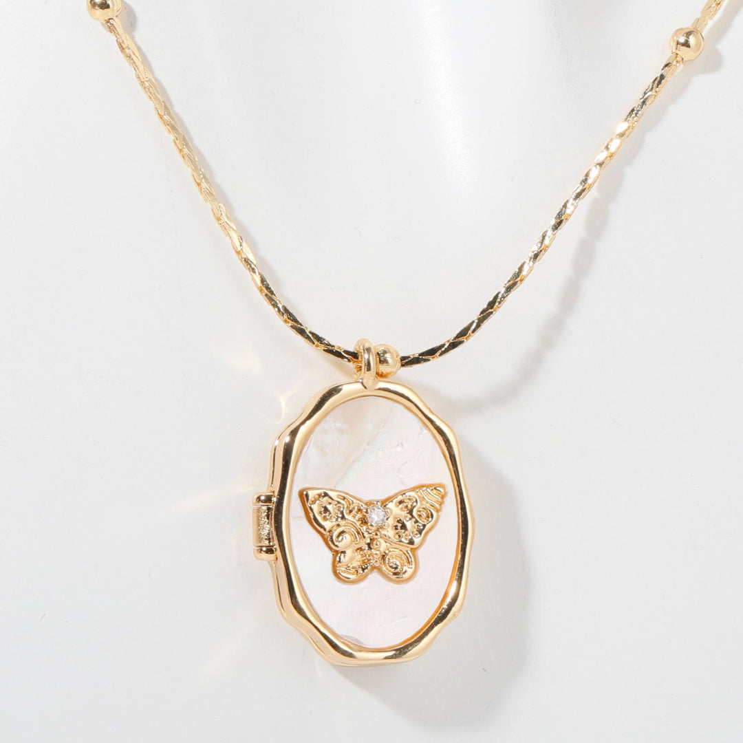 Collier pendentif papillon en nacre Olivenorma en cuivre plaqué or 14 carats 
