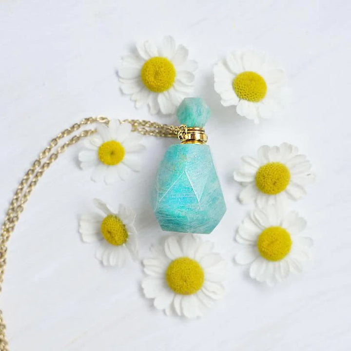 Collier bouteille de parfum en cristal