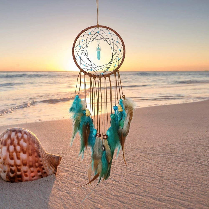 Attrape-rêves traditionnel en plumes turquoise fait main Olivenorma