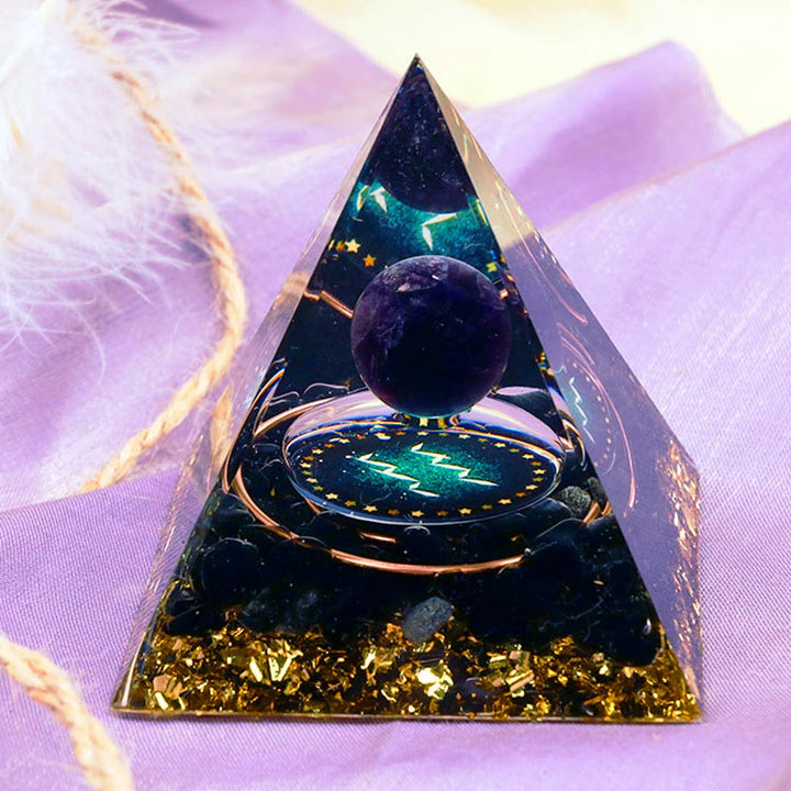 Sphère d'améthyste Olivenorma avec pyramide d'orgone du zodiaque Verseau en obsidienne 