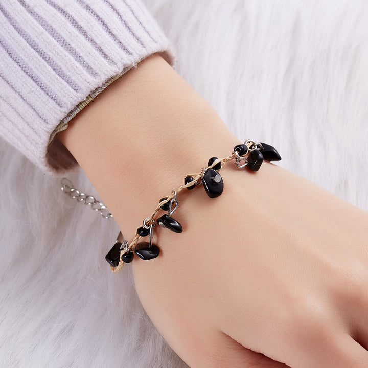 Bracelet tressé en gravier avec pompon en obsidienne et améthyste œil de tigre Olivenorma