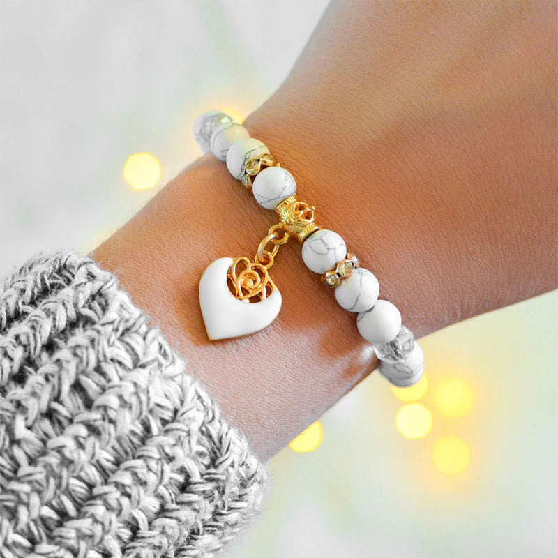 Bracelet en perles turquoise et rose blanche Olivenorma