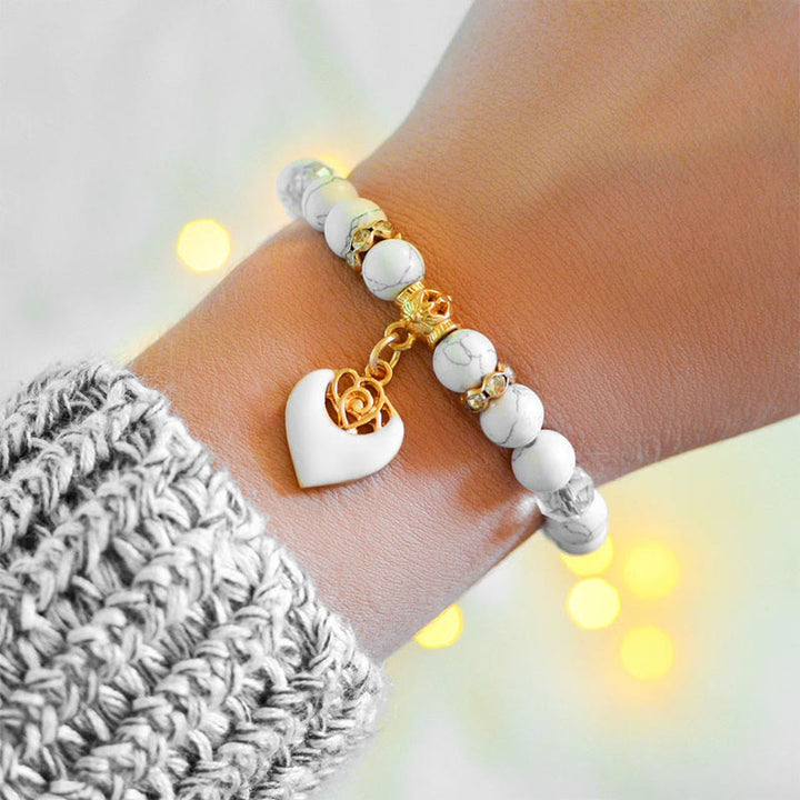 Bracelet en perles turquoise et rose blanche Olivenorma