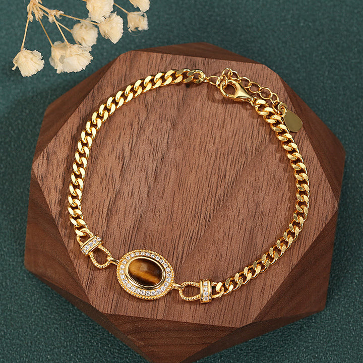 Bracelet en or oeil de tigre Olivenorma "Le livre de la galaxie"