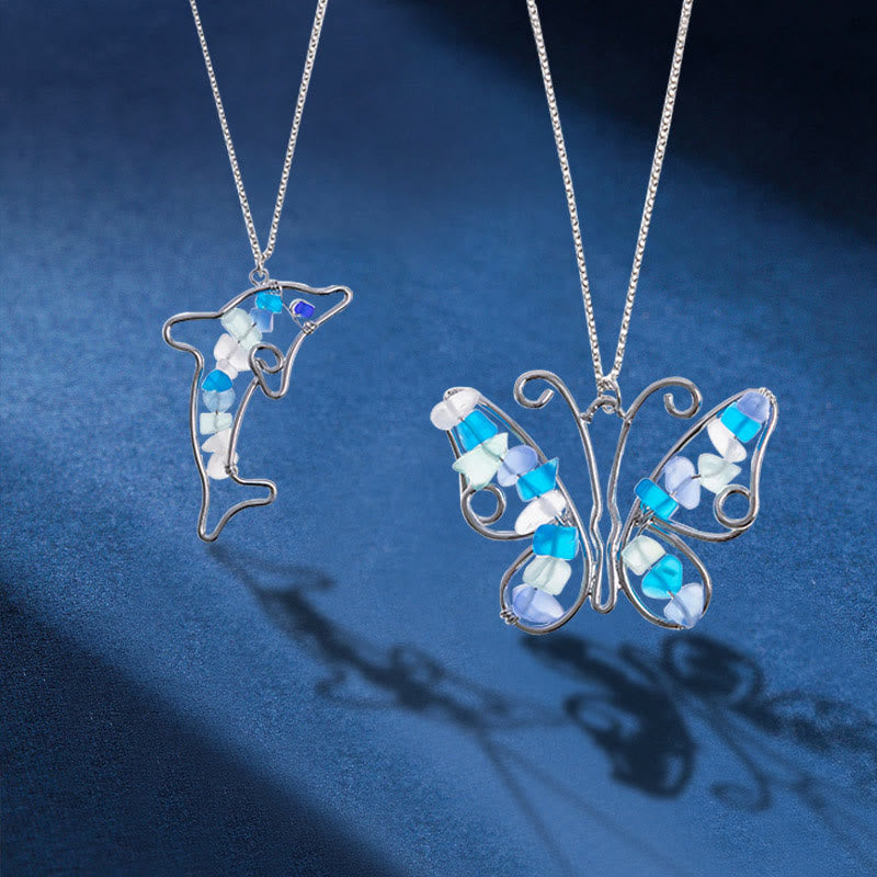Collier en verre de mer avec papillon et dauphin Olivenorma 