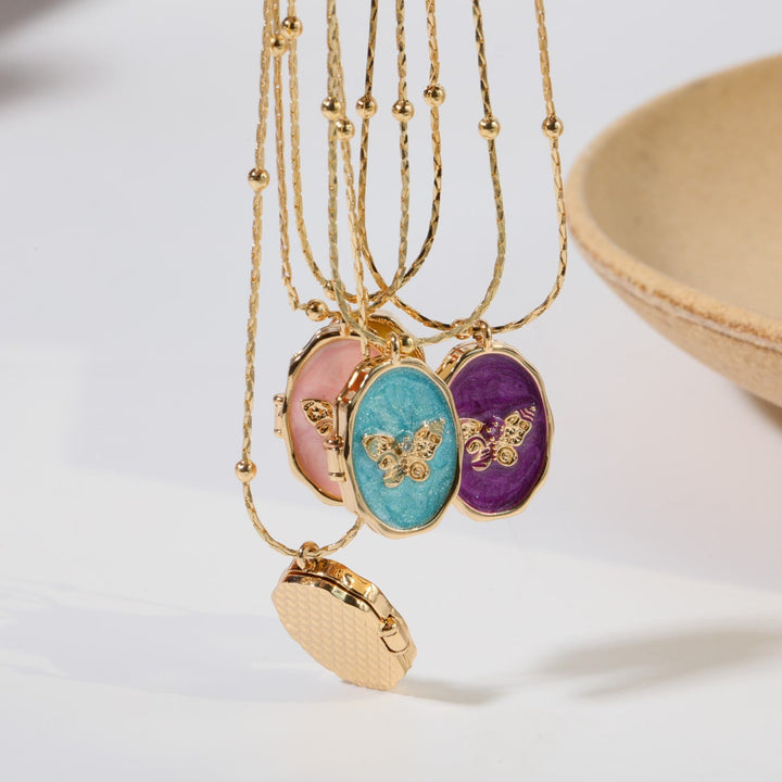 Collier pendentif papillon en nacre Olivenorma en cuivre plaqué or 14 carats 