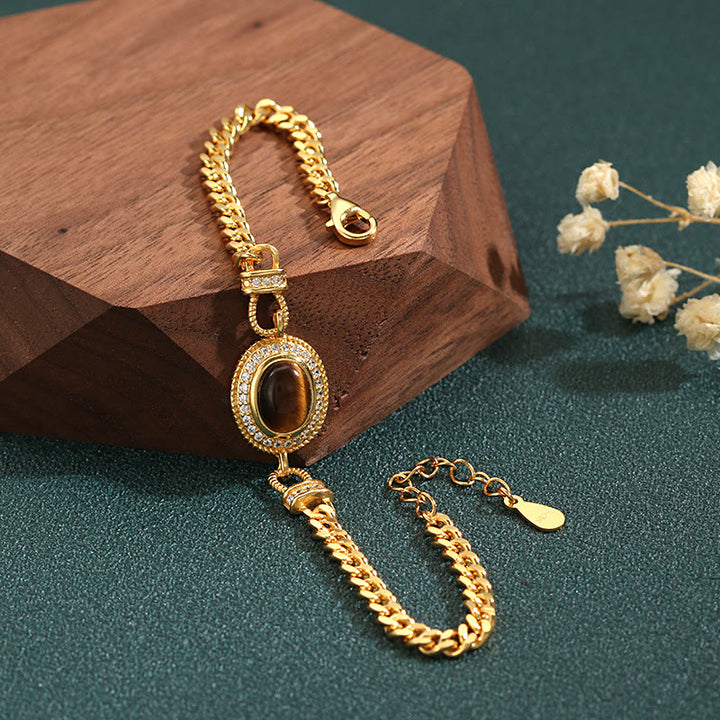 Bracelet en or oeil de tigre Olivenorma "Le livre de la galaxie"
